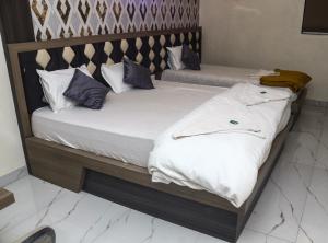 Hotel Grace Lodging & Boarding客房内的一张或多张床位