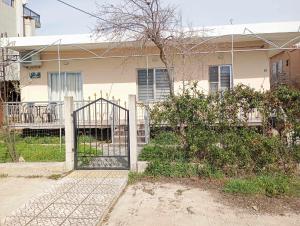 a gate in front of a house at Peaceful house in Alexandroupoli