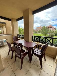 Balkón nebo terasa v ubytování Urbanización Jardines de Isla canela vista jardín By SIT