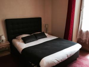 Postel nebo postele na pokoji v ubytování Ma Petite Auberge