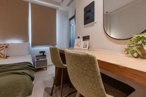 TV a/nebo společenská místnost v ubytování 1864 Apartments