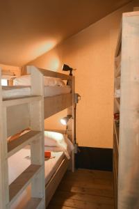 A bed or beds in a room at Casa Mobile - Cisano San Vito ****