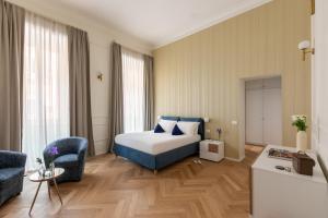 Ένα ή περισσότερα κρεβάτια σε δωμάτιο στο SJR Luxury Apartment Trevi Fountain