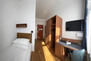 TV o dispositivi per l'intrattenimento presso Hotel Secession an der Oper