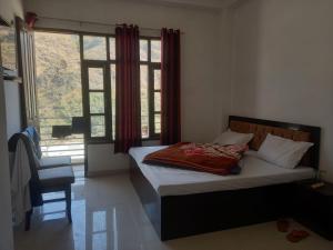Postel nebo postele na pokoji v ubytování Hotel Shree Ram