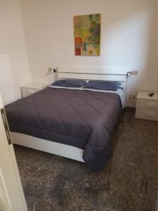 Ένα ή περισσότερα κρεβάτια σε δωμάτιο στο Casa Rosa I.U.N Q9637