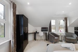 Μια τηλεόραση ή/και κέντρο ψυχαγωγίας στο Private multi apartment house in the heart of Oxford