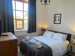 Postel nebo postele na pokoji v ubytování Barnstaple - apartment- Sleeps 2 - Parking