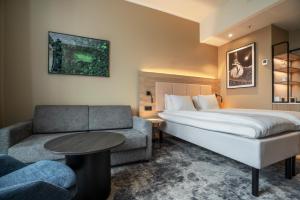 Postel nebo postele na pokoji v ubytování Thon Partner Hotel Ullevaal Stadion