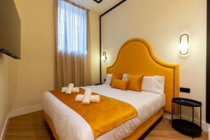 Кровать или кровати в номере Apartamentos Alvarado 5 +42 фотографии