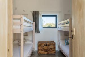 Postel nebo postele na pokoji v ubytování Villa Aura d`Olivo by Perle di Puglia + 32 fotografií