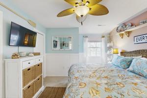 a bedroom with a bed and a ceiling fan at Mallard Lakes --- 37816 Eagle Ln. # 322 in Selbyville +35 photos