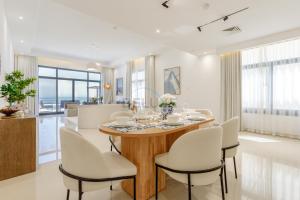 A seating area at Sea Views 4BR and Assistant's Room Villa with Heated Pool, Sharm - Al Dana Villa, Al Dana Island by Deluxe Holiday Homes