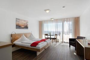 Ein Bett oder Betten in einem Zimmer der Unterkunft Gästehaus D i c k r e i t e r