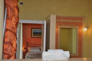 Postel nebo postele na pokoji v ubytování B&B Agrifoglio + 37 fotografií