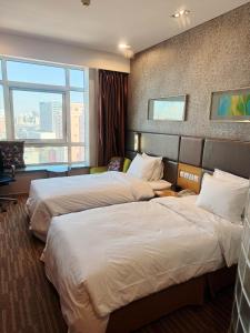 Кровать или кровати в номере Holiday Inn Express Beijing Dongzhimen by IHG