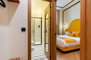 Кровать или кровати в номере Apartamentos Alvarado 5