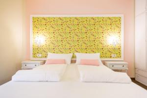 Postel nebo postele na pokoji v ubytování Hotel Speranza