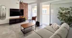 TV a/nebo společenská místnost v ubytování Sant Vicent 10 Old Town apt