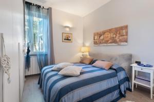 Postel nebo postele na pokoji v ubytování Paradise Suite