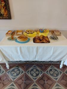 a table with food and desserts on it at B&B Don Antonio in Civitella Casanova +3 photos