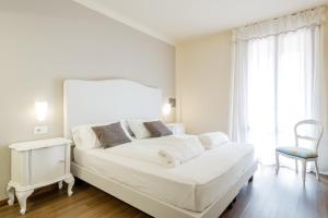 Postel nebo postele na pokoji v ubytování Hotel Speranza