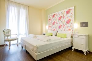 Postel nebo postele na pokoji v ubytování Hotel Speranza