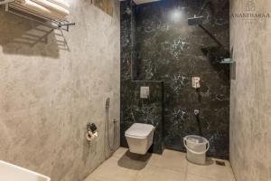 Koupelna v ubytování Anantharaa Hotel