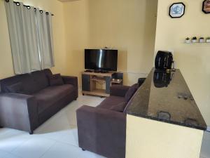 Télévision ou salle de divertissement dans l'établissement Espaço Camões