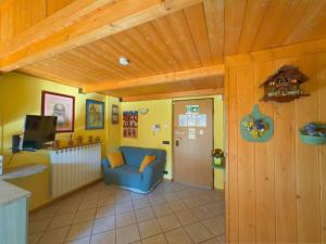 TV a/nebo společenská místnost v ubytování Casa Aliza - Duplex Alpino