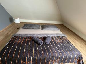 Postel nebo postele na pokoji v ubytování APARTMENTS TRENČÍN