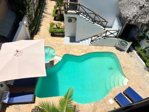Bazén v ubytování Boutique Ocean View Nungwi nebo v jeho okolí