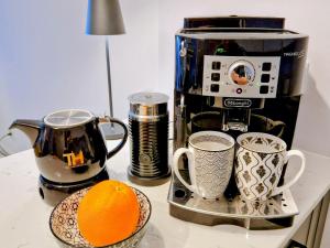 Kaffee-/Teezubehör in der Unterkunft Ferienwohnung Lieblingssuite am Strand