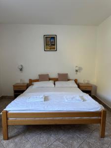 Postel nebo postele na pokoji v ubytování Hotel Višegrad