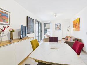 TV a/nebo společenská místnost v ubytování Chez PAM - appartement de standing, vue Léman
