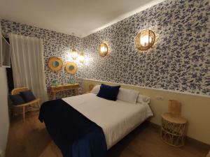 Postel nebo postele na pokoji v ubytování Hotel Diego