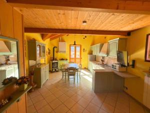 Kuchyň nebo kuchyňský kout v ubytování Casa Aliza - Duplex Alpino