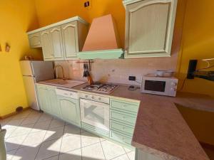 Kuchyň nebo kuchyňský kout v ubytování Casa Aliza - Duplex Alpino + 16 fotografií