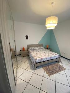 Postel nebo postele na pokoji v ubytování La Villa di Gina