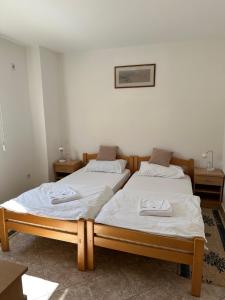 Postel nebo postele na pokoji v ubytování Hotel Višegrad