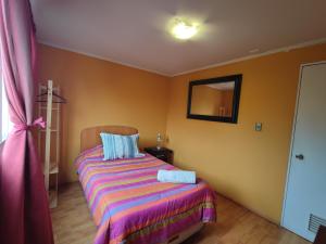 Postel nebo postele na pokoji v ubytování HOSTAL LA CASONA ALFREDO CAMPOS