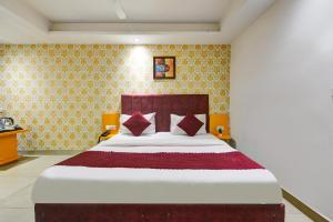 Postel nebo postele na pokoji v ubytování Hotel Happy Stay Delhi Airport