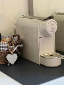 a sewing machine with a heart next to a basket at Casale Milleseicento in Gavi +12 photos