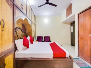 Voodi või voodid majutusasutuse Hotel O Smart View toas