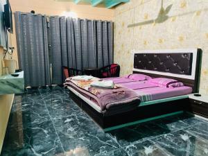 Letto o letti in una camera di New Sahil