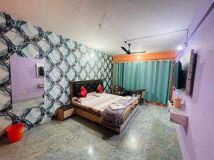 Letto o letti in una camera di New Sahil