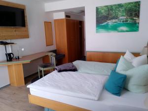 Kuchyň nebo kuchyňský kout v ubytování Paulin Hotel Trier