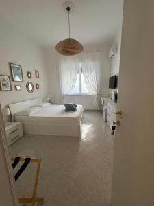 Posteľ alebo postele v izbe v ubytovaní A Due Passi dal Mare B&B