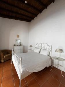 Giường trong phòng chung tại Casa Grande - Amieira Houses