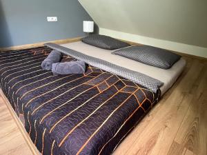 Postel nebo postele na pokoji v ubytování APARTMENTS TRENČÍN